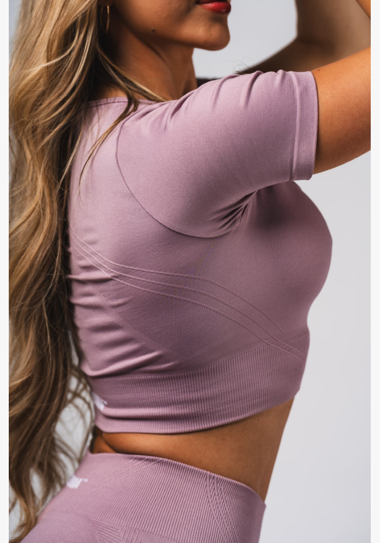 NEBBIA Tvarující bezešvý crop top FLOW SEAMLESS růžové NEBBIA Tvarující bezešvý crop top FLOW SEAMLESS růžové