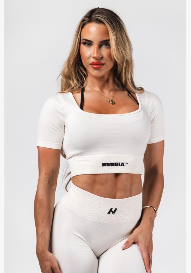 NEBBIA Tvarujúci bezšvový crop top FLOW SEAMLESS krémový NEBBIA Tvarujúci bezšvový crop top FLOW SEAMLESS krémový